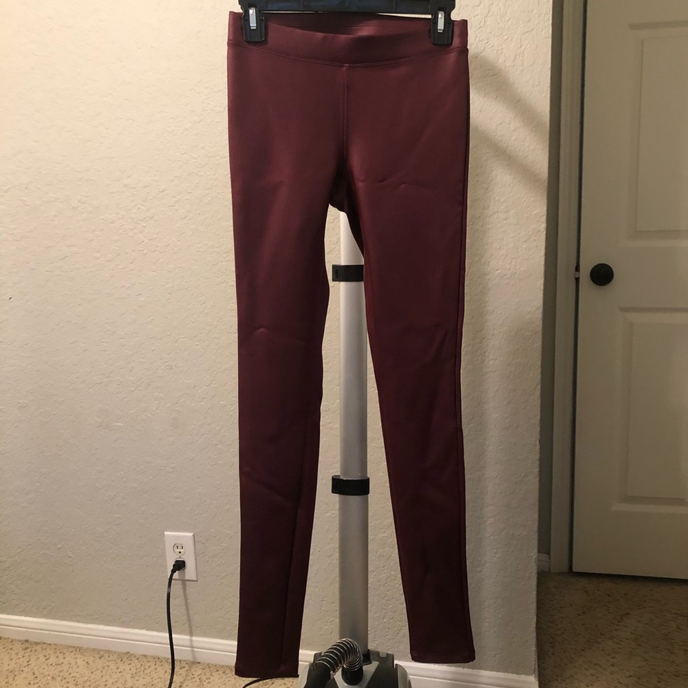 Express burgundy faux leather leggings